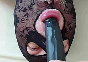 Oral sex with a long dildo