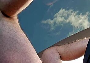 Gay masturbation with a dildo in his car