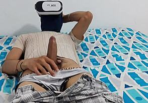 Gay man enjoys VR porn and masturbates with his big dick