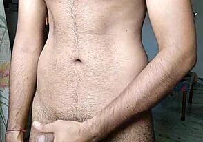 Hairy Indian guy in hotel room, pleasuring himself with a finger
