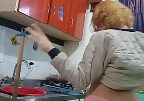 Crossdresser in action in a hot scene with a shemale